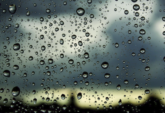 A window with raindrops on it looks beautiful but being sparkling clean would be even more beautiful.